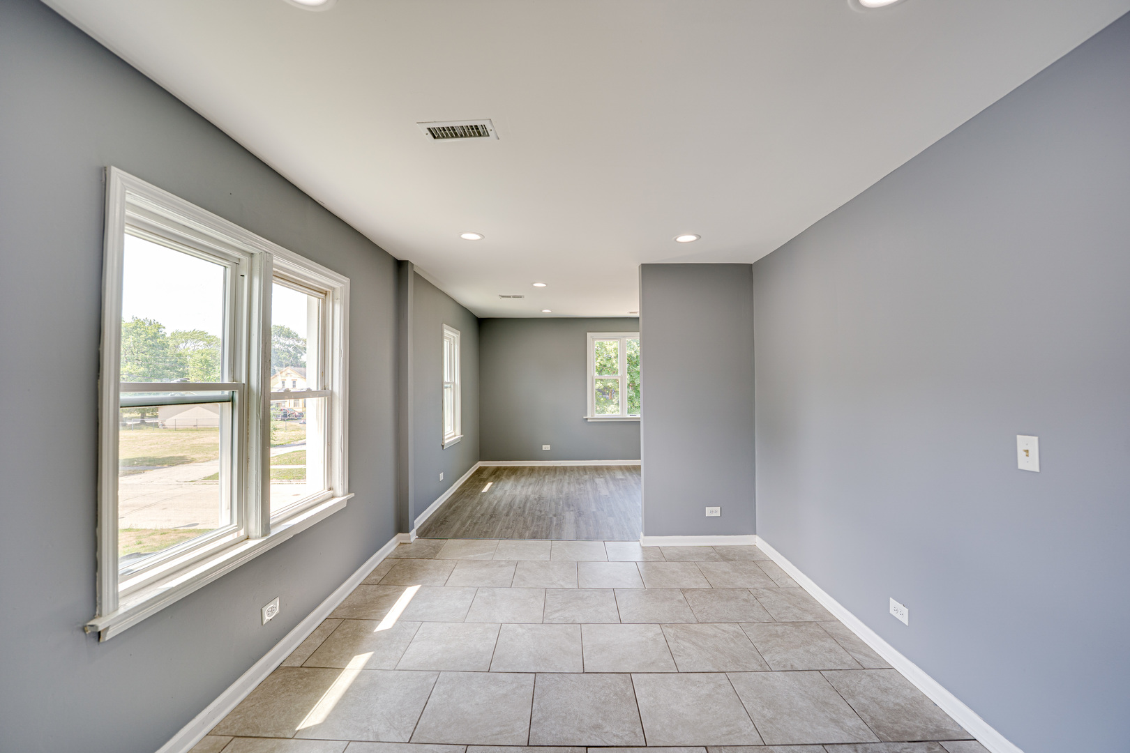 208 Mound Street, Unit 2 Joliet, IL 60433 - Photo 7 of 18 a view of an empty room and window