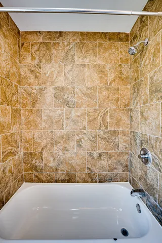 a bathroom with a bathtub