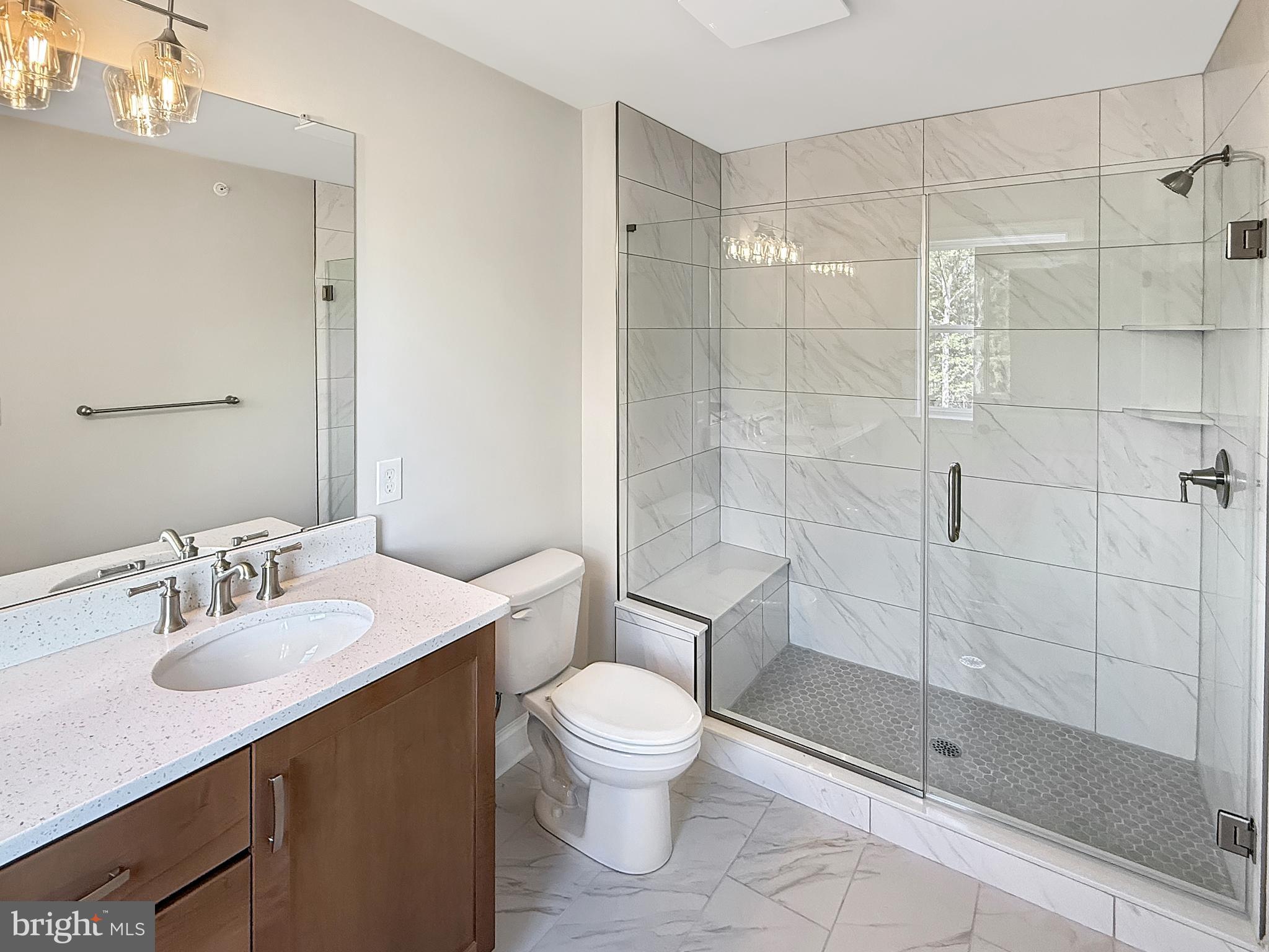 9 Schadle Road Perkasie, PA 18944 - Photo 22 of 44 a bathroom with a sink toilet and shower