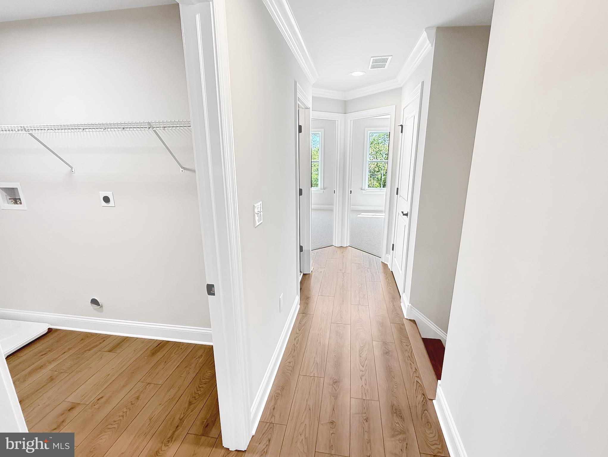 9 Schadle Road Perkasie, PA 18944 - Photo 41 of 44 a view of a hallway with wooden floor and staircase