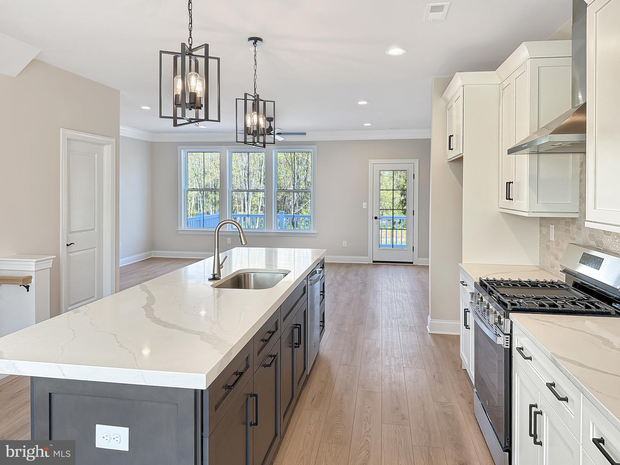 9 Schadle Road Perkasie, PA 18944 - Photo 9 of 44 a kitchen with granite countertop a sink a counter space appliances and cabinets
