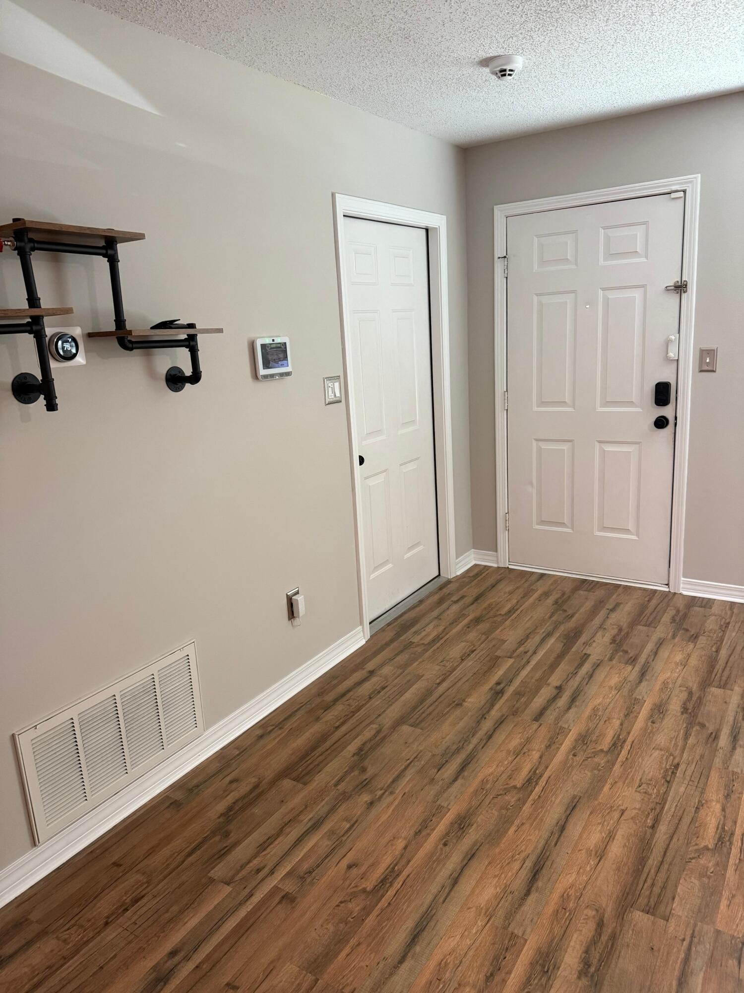38 Ruby Circle Mary Esther, FL 32569 - Photo 25 of 50 a view of empty room with wooden floor