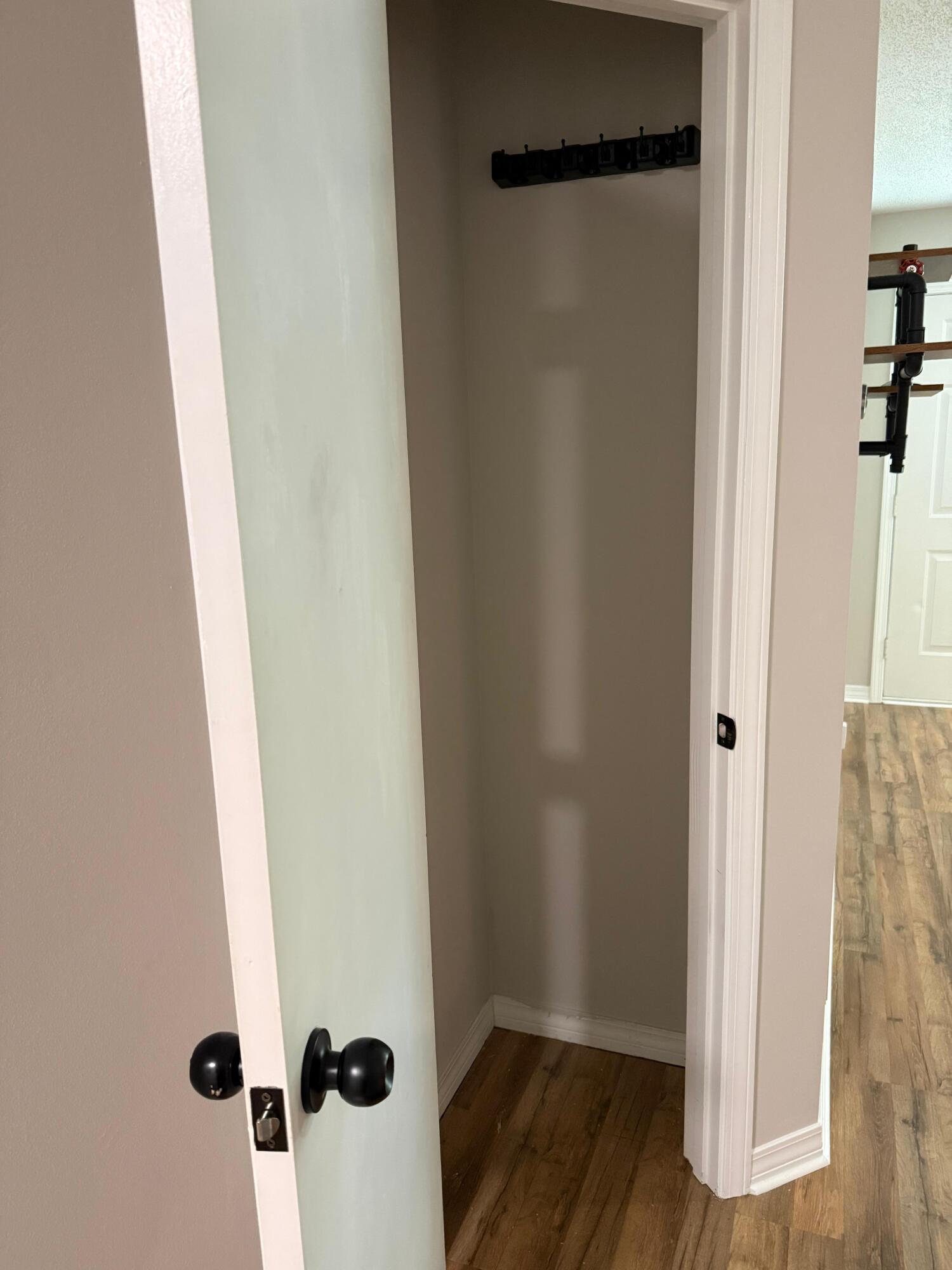38 Ruby Circle Mary Esther, FL 32569 - Photo 29 of 50 a view of a hallway with wooden floor