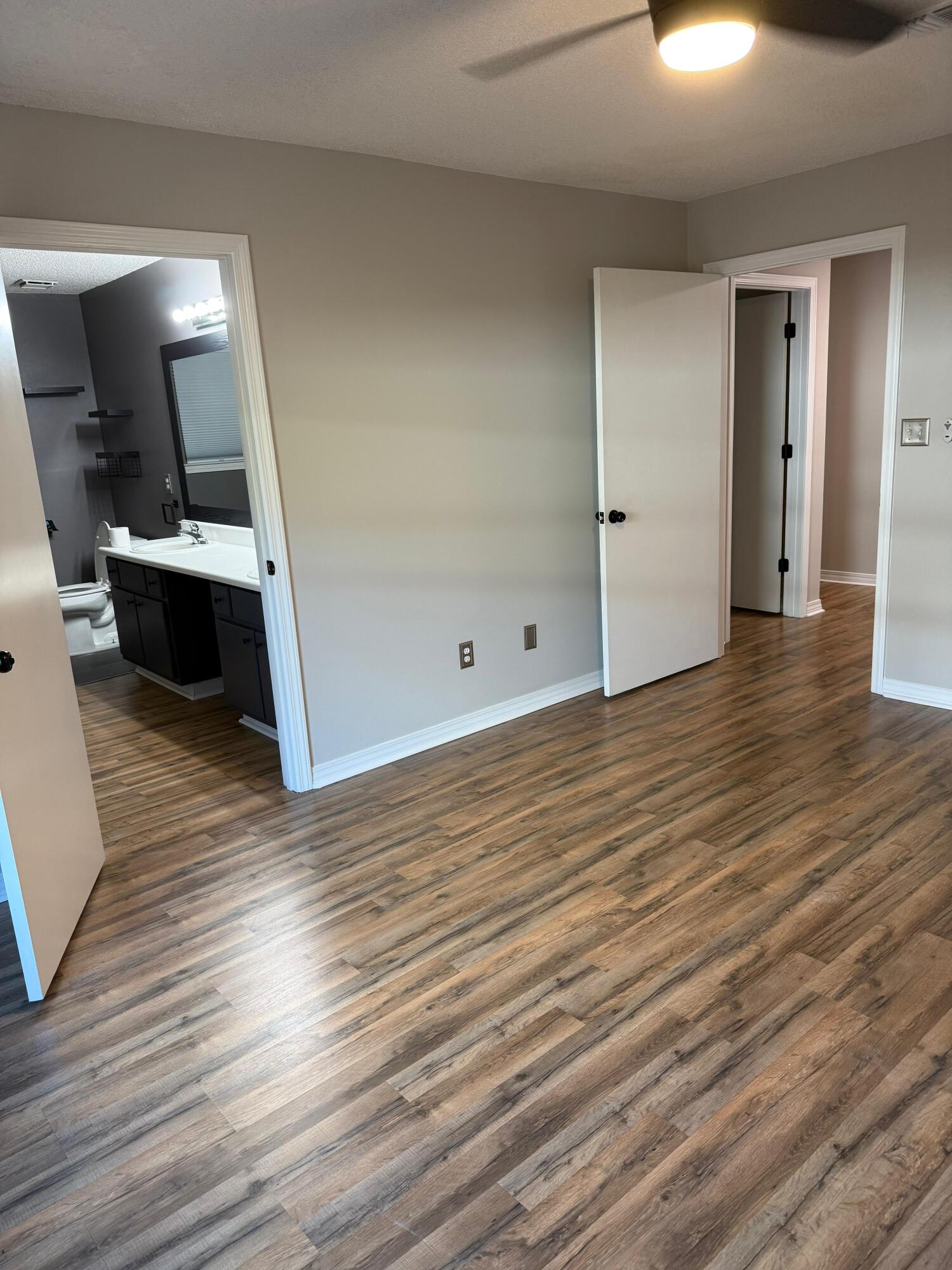 38 Ruby Circle Mary Esther, FL 32569 - Photo 35 of 50 a view of an empty room with wooden floor and a window