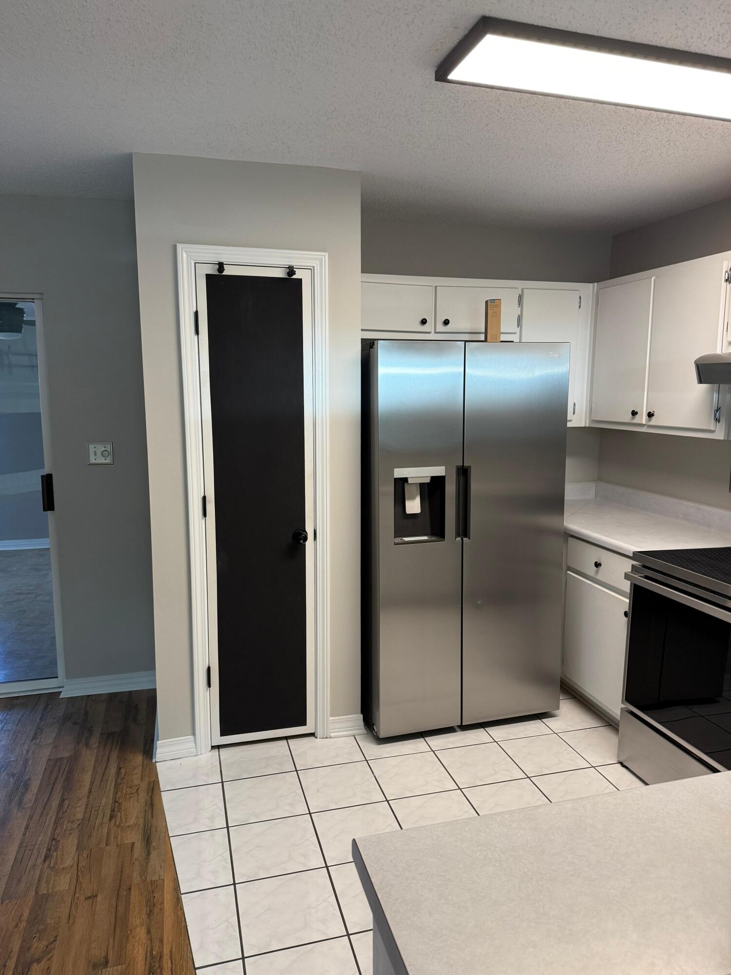 38 Ruby Circle Mary Esther, FL 32569 - Photo 9 of 50 a kitchen with granite countertop a refrigerator and a stove