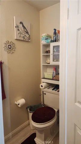 a bathroom with a toilet and a sink