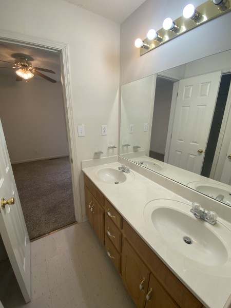 241 Tree Line Drive Oak Grove, KY 42262 - Photo 15 of 19 a bathroom with a double vanity sink a and mirror