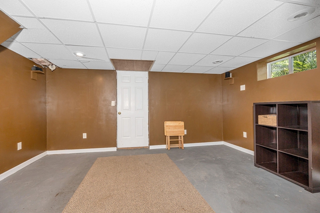 180 Foster Road Tewksbury, MA 01876 - Photo 24 of 38 a view of a livingroom with an empty space