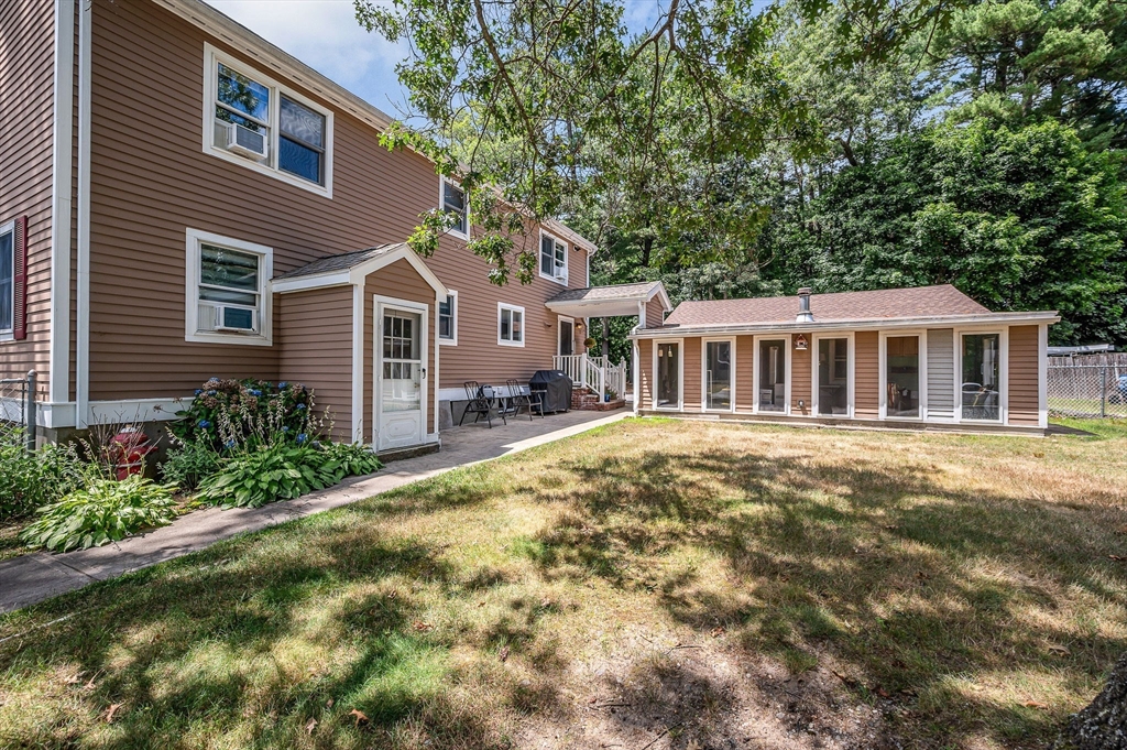 180 Foster Road Tewksbury, MA 01876 - Photo 32 of 38 a view of a house with a swimming pool