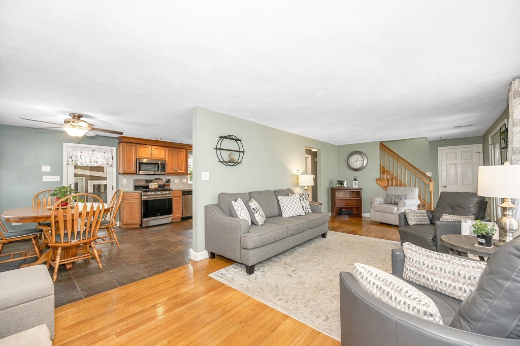 180 Foster Road Tewksbury, MA 01876 - Photo 5 of 38 a living room with furniture and a large window