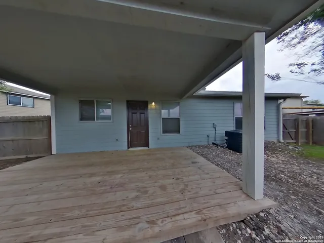a view of livingroom with workspace and entryway