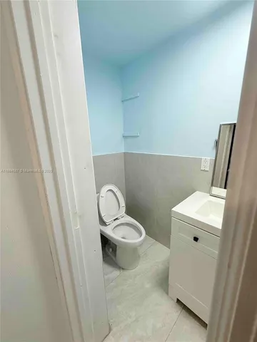 a bathroom with a sink and a toilet
