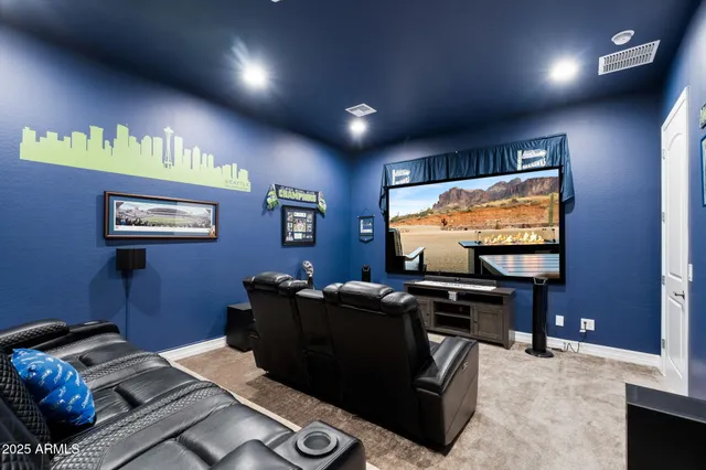 a projector room with furniture projector and screen