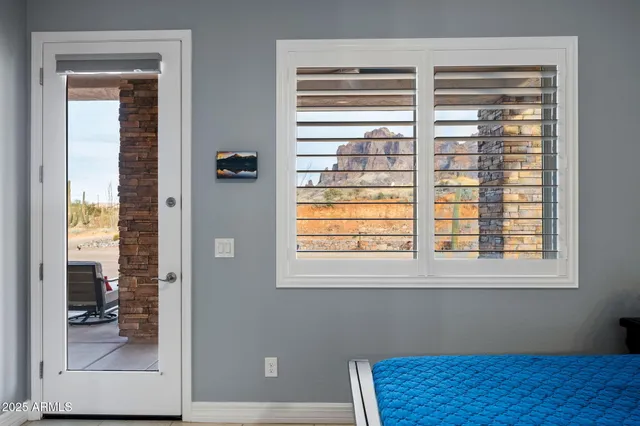 a view of a room that has a window in it