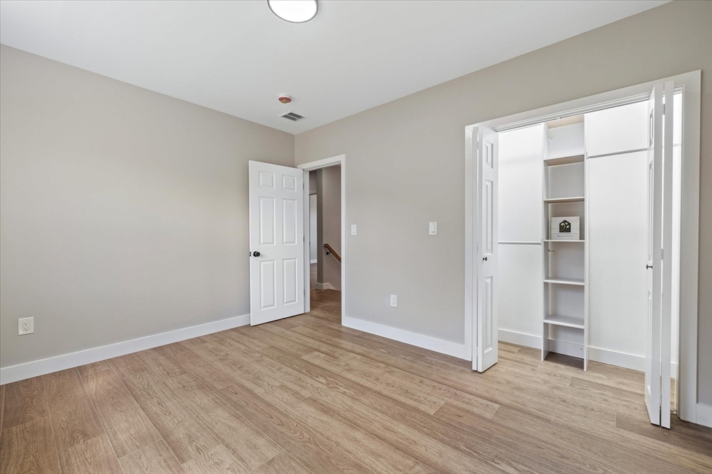 6 Eagleton Street Spencer, MA 01562 - Photo 28 of 36 a view of an empty room with wooden floor and closet