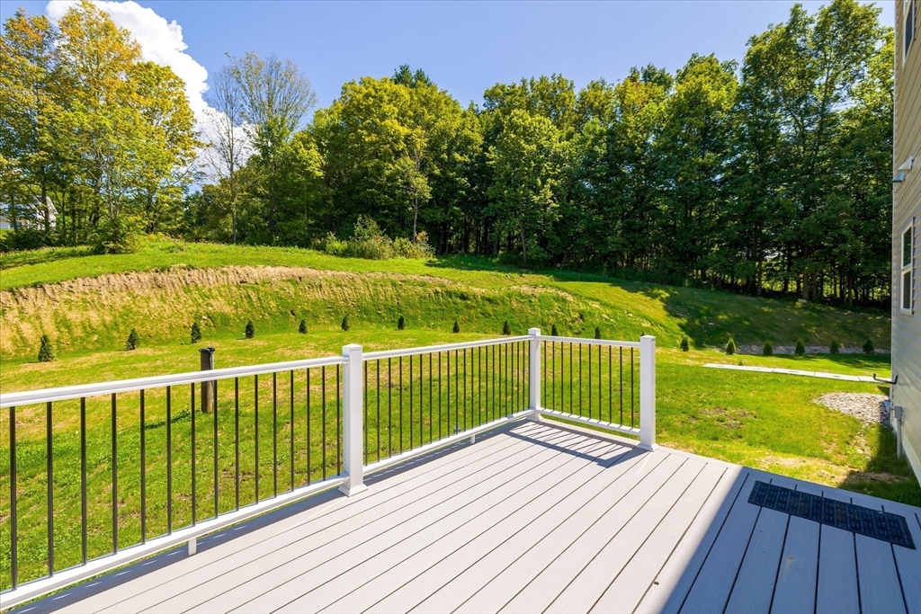 6 Eagleton Street Spencer, MA 01562 - Photo 32 of 36 a view of balcony with wooden floor and fence