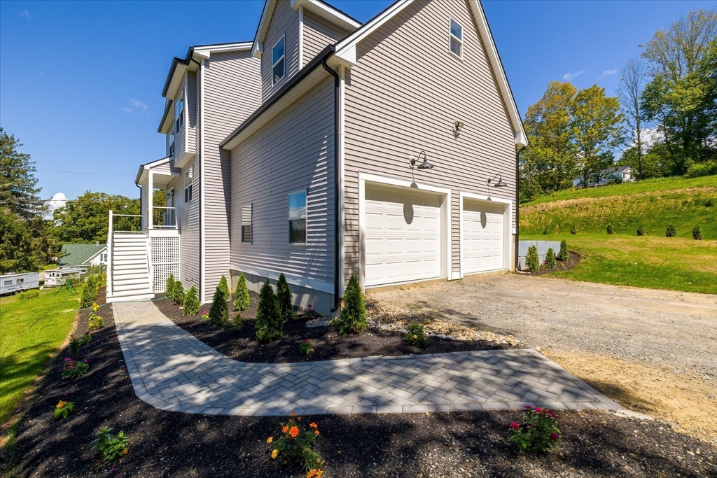 6 Eagleton Street Spencer, MA 01562 - Photo 33 of 36 a view of a house with backyard and garden