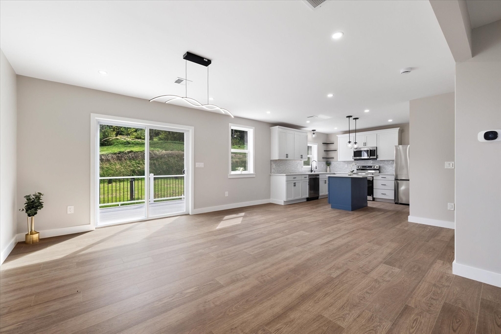 6 Eagleton Street Spencer, MA 01562 - Photo 8 of 36 a view of a kitchen with a sink and a window