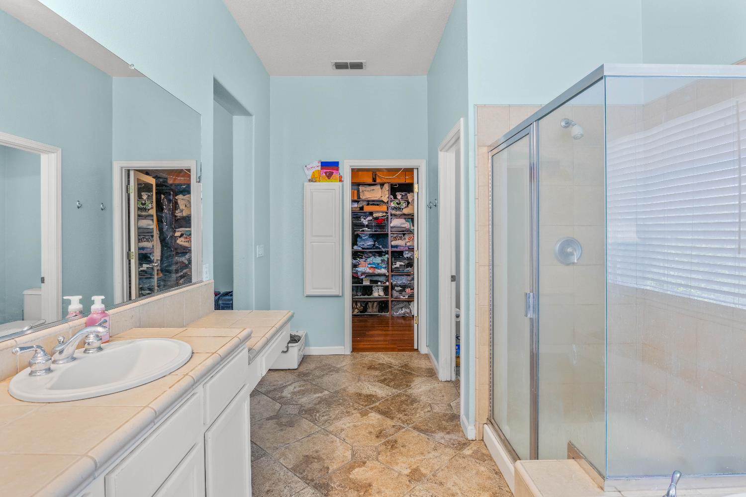 1777 Daniel Drive Ripon, CA 95366 - Photo 26 of 44 a bathroom with a sink a toilet and shower