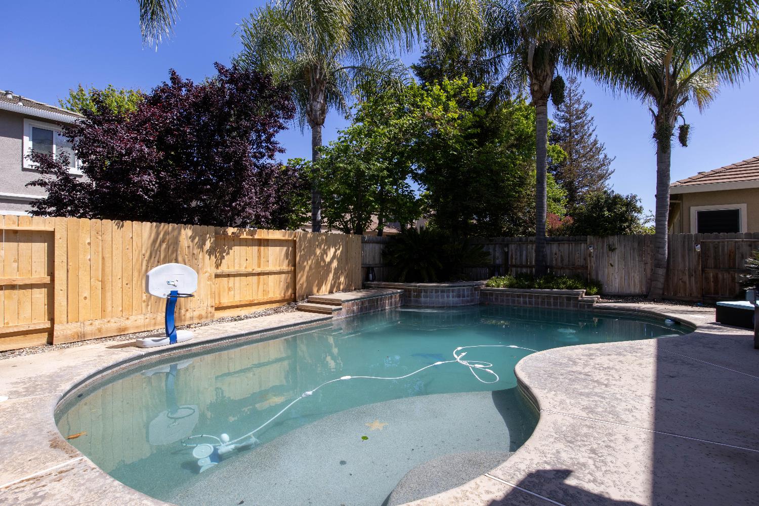 1777 Daniel Drive Ripon, CA 95366 - Photo 36 of 44 a view of a swimming pool with a patio