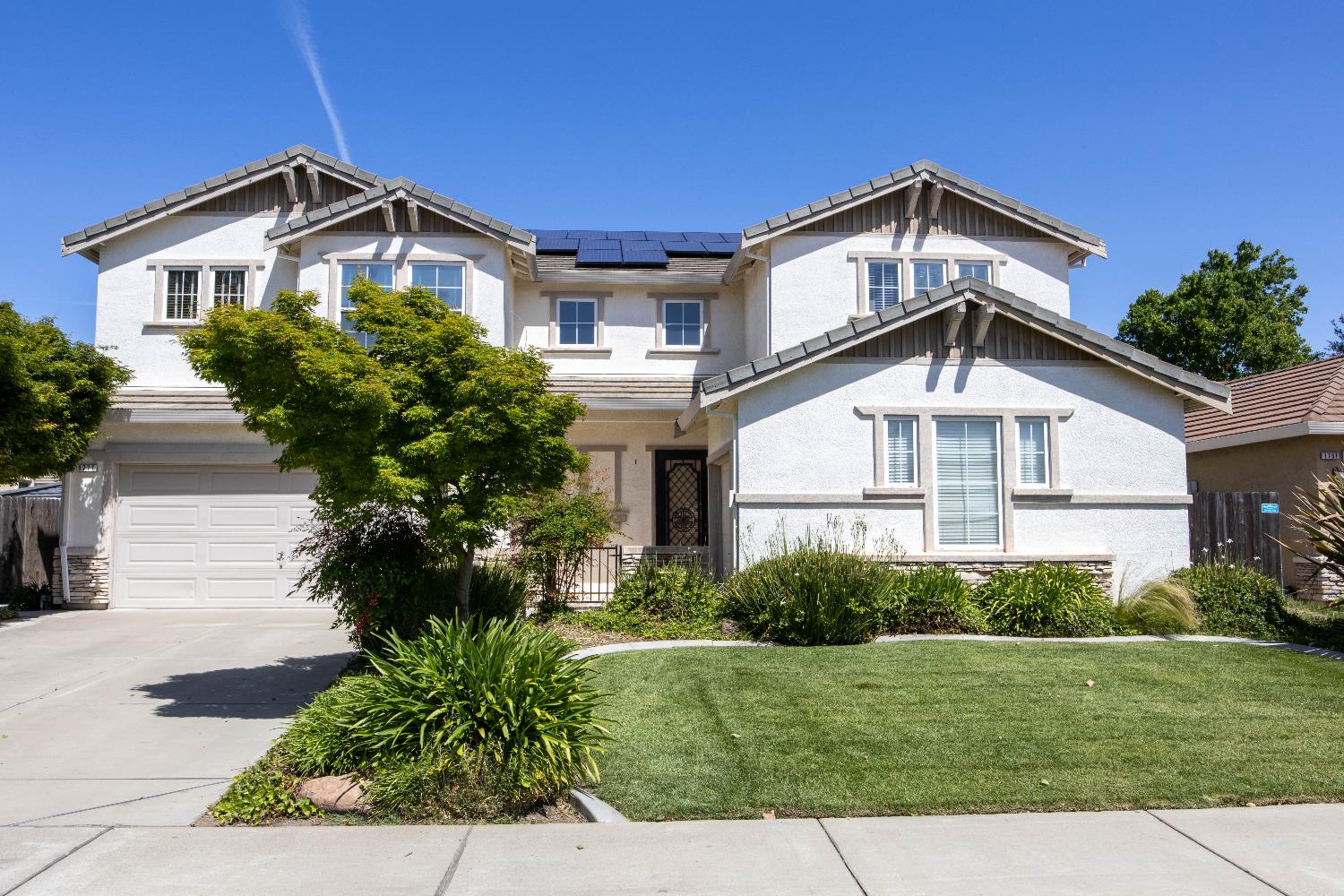 1777 Daniel Drive Ripon, CA 95366 - Photo 42 of 44 a front view of a house with a yard