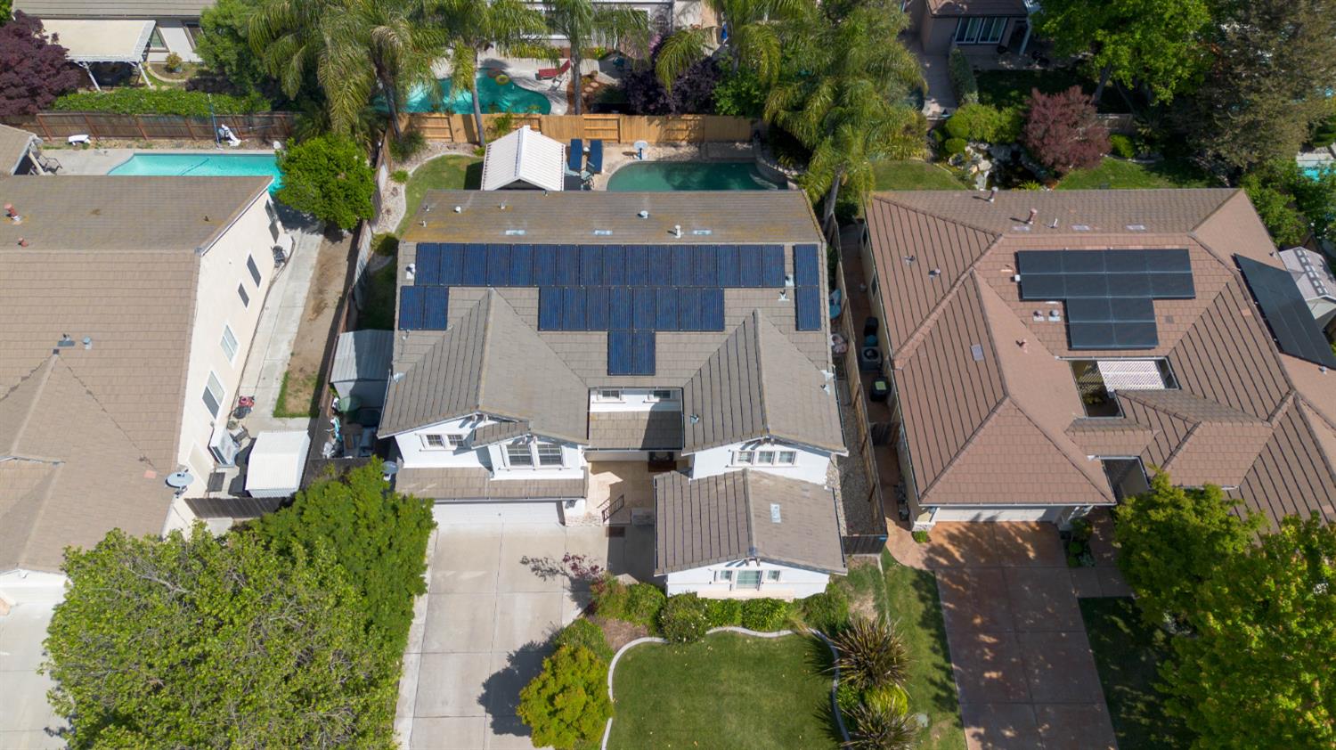 1777 Daniel Drive Ripon, CA 95366 - Photo 44 of 44 an aerial view of a house with a yard and lake view