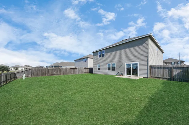 a view of a lake with a big yard