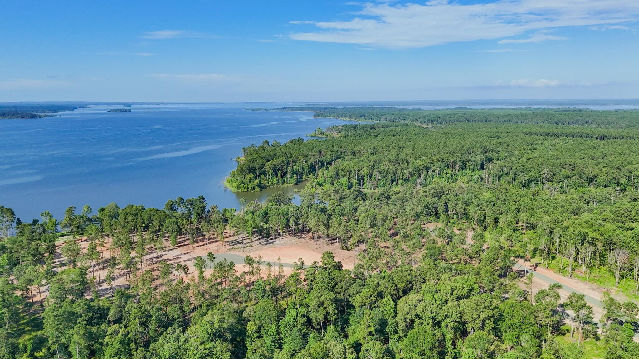 331 Debbie Lane Bronson, TX 75930 - Photo 2 of 17 a view of a field with an ocean