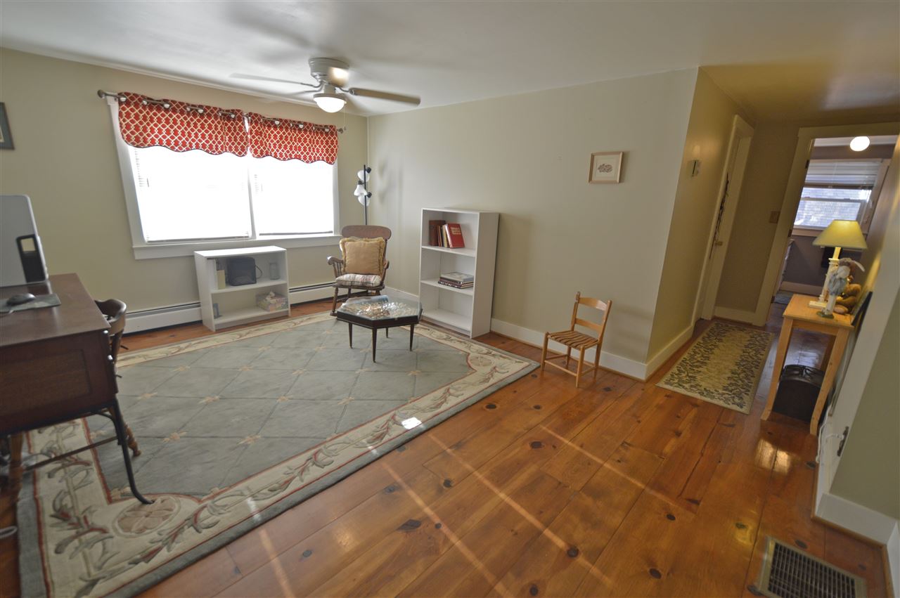 62 Jonestown Road Fairfield, VA 24435 - Photo 22 of 42 a living room with furniture a window and a flat screen tv