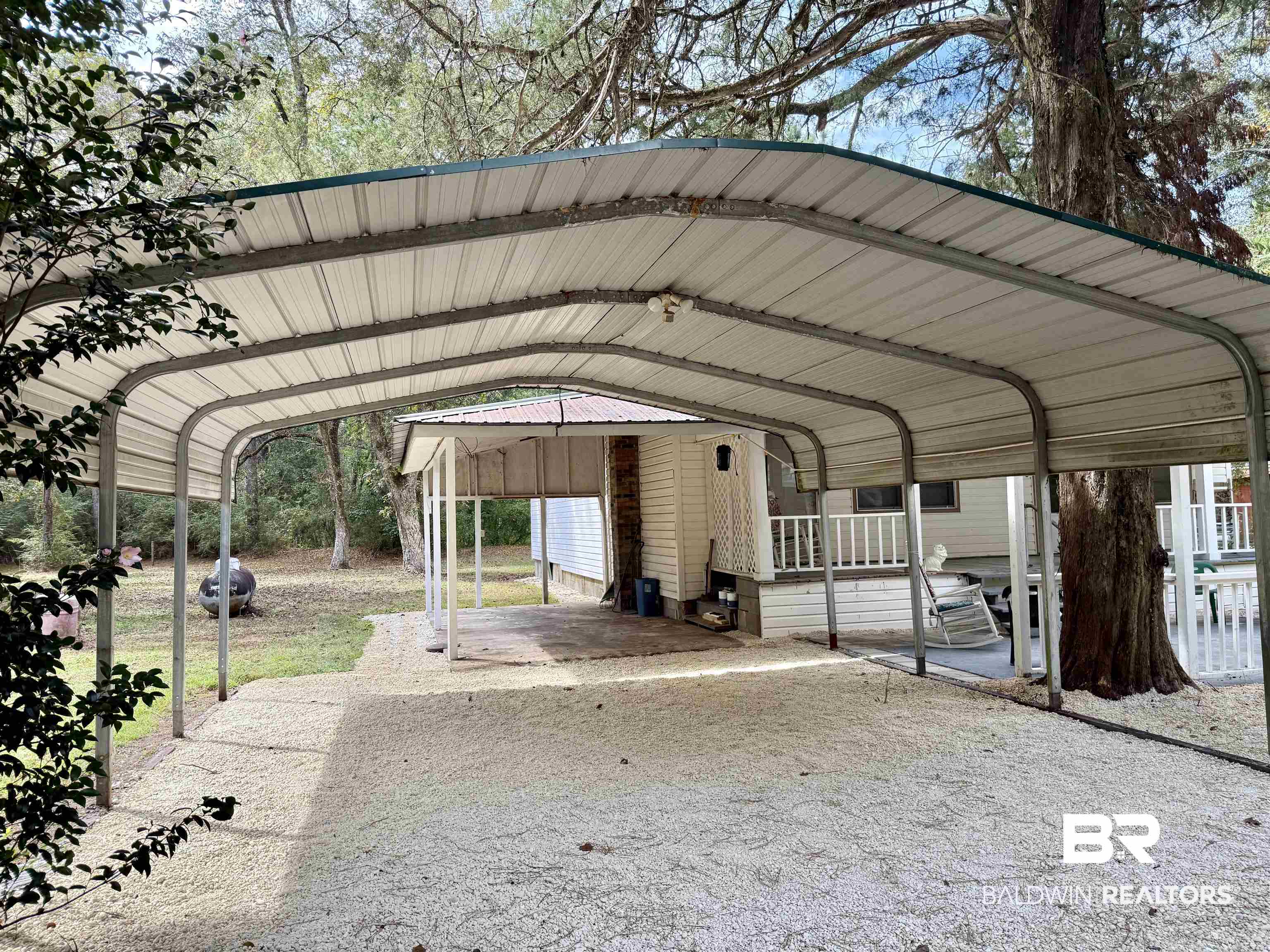 826 West Side Road Castleberry, AL 36432 - Photo 30 of 34 View of vehicle parking featuring a detached carport