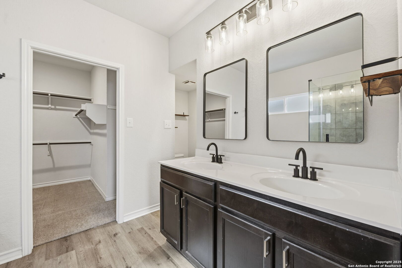 328 Swift Move Cibolo, TX 78108 - Photo 18 of 32 a bathroom with a sink and a mirror