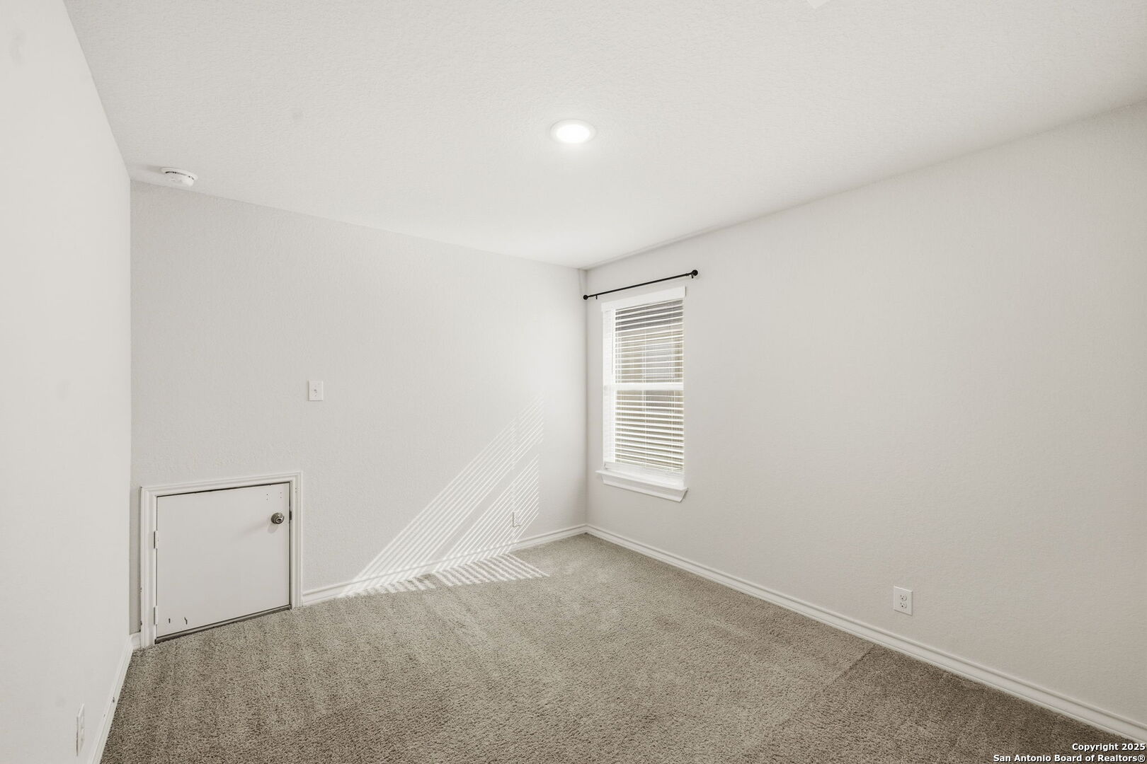 328 Swift Move Cibolo, TX 78108 - Photo 19 of 32 a view of an empty room with a window