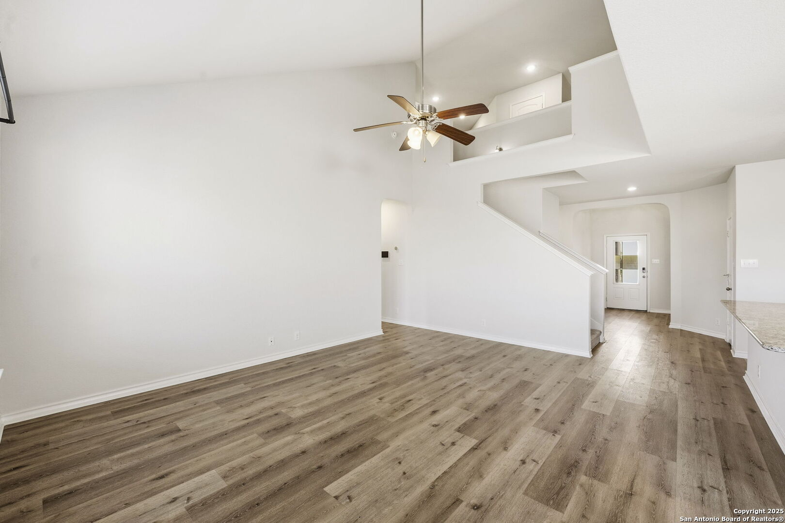 328 Swift Move Cibolo, TX 78108 - Photo 6 of 32 a view of empty room with wooden floor and ceiling fan