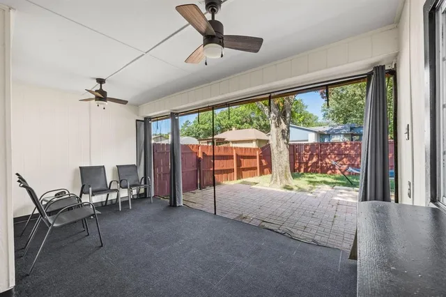 a view of a livingroom with furniture and a yard