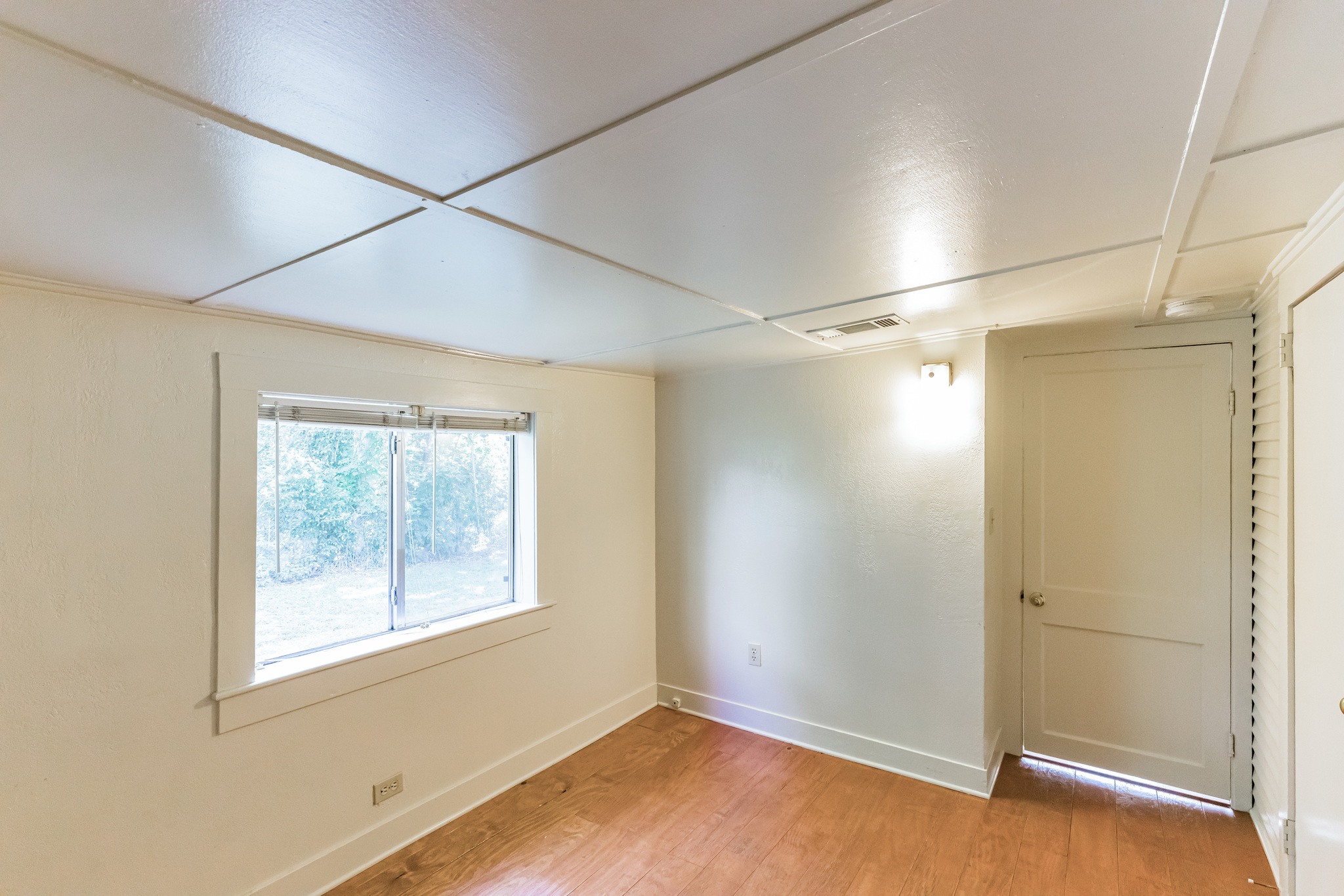 501 East 4th Street Georgetown, TX 78626 - Photo 20 of 25 Unfurnished room with light wood-style floors and baseboards