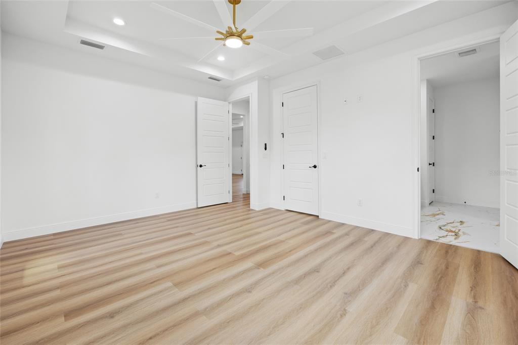 9789 Southwest 125th Ct Road Dunnellon, FL 34432 - Photo 23 of 37 wooden floor in an empty room