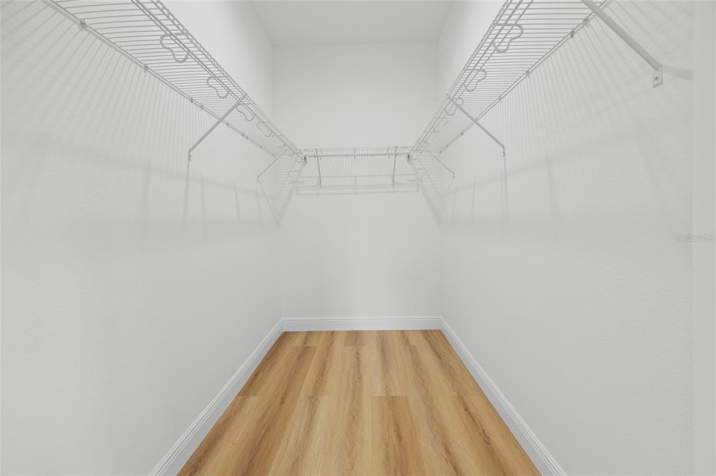 9789 Southwest 125th Ct Road Dunnellon, FL 34432 - Photo 24 of 37 a view of a room with racks on the wall