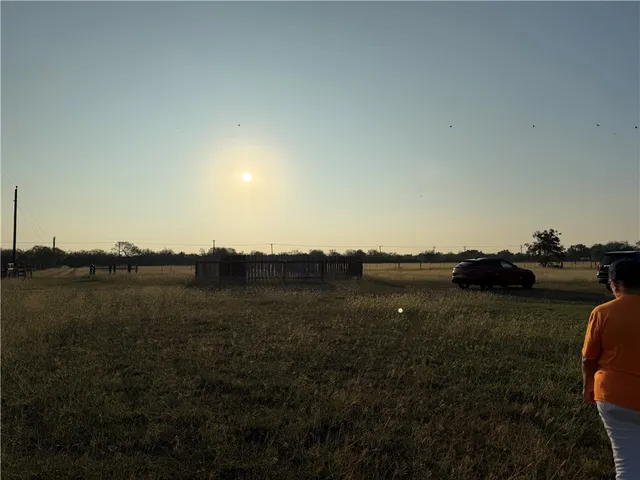 an aerial view of residential house with outdoor space