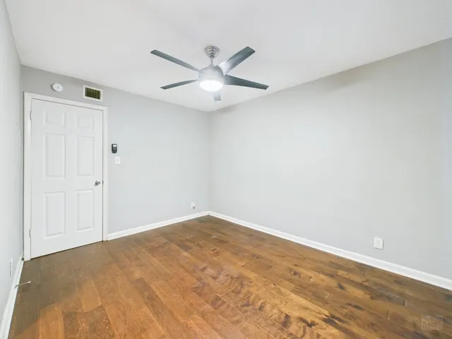 a view of a building with a yard