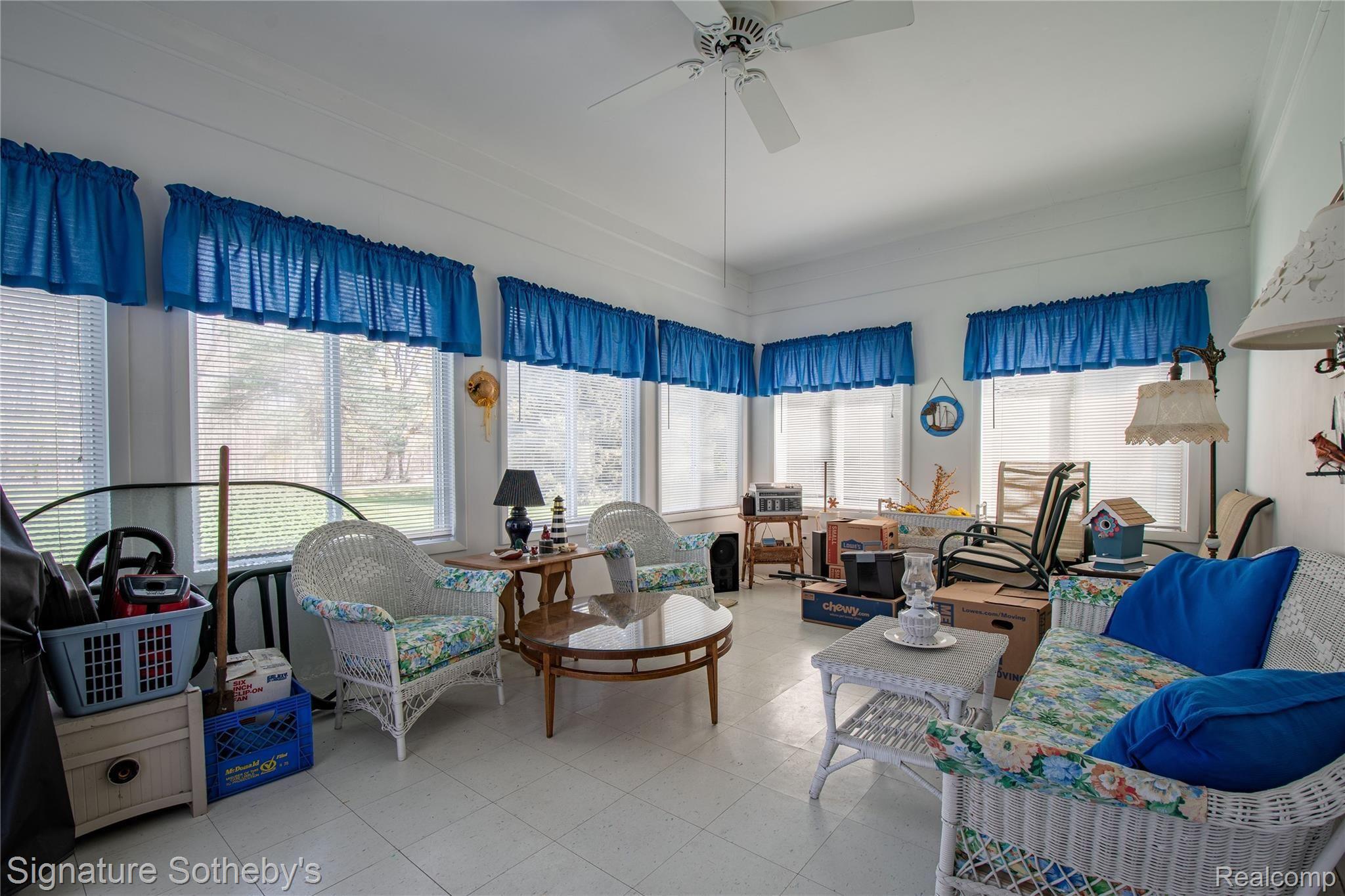 2500 South Hickory Ridge Road Milford, MI 48380 - Photo 6 of 40 Three season room offers extra room to entertain