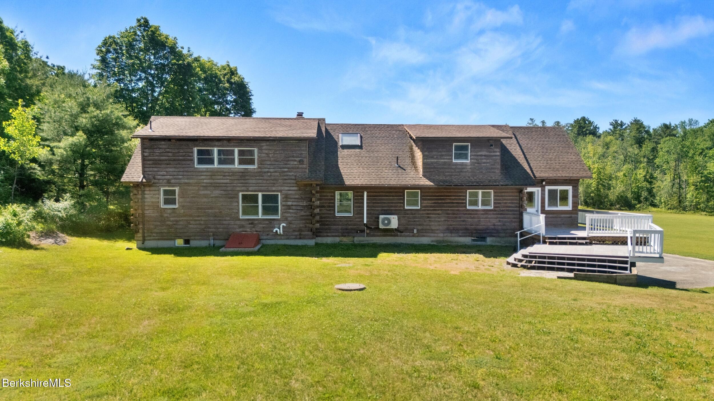 134 Hurlburt Road Great Barrington, MA 01230 - Photo 7 of 50 a front view of a house with a yard