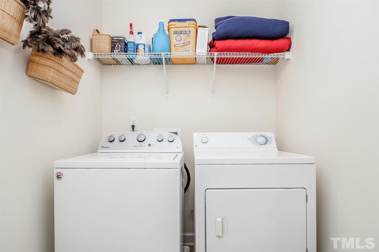 2112 Stoney Spring Drive Raleigh, NC 27610 - Photo 19 of 25 a utility room with dryer and washer