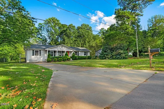 a house with garden in the background