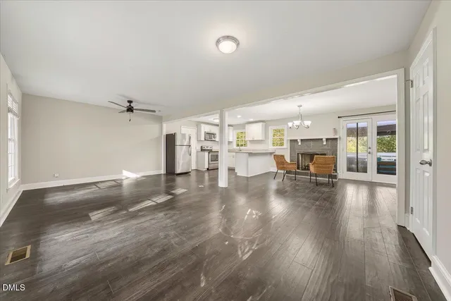 a view of a livingroom with wooden floor
