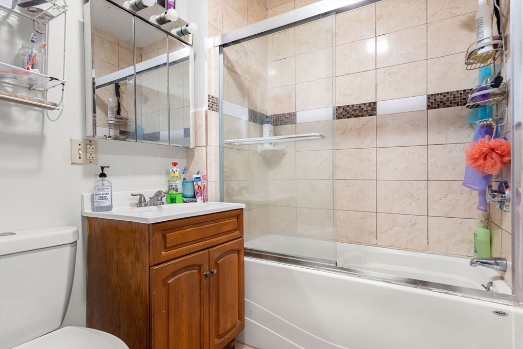 90 Timson Street Lynn, MA 01902 - Photo 18 of 38 a bathroom with a sink toilet and shower