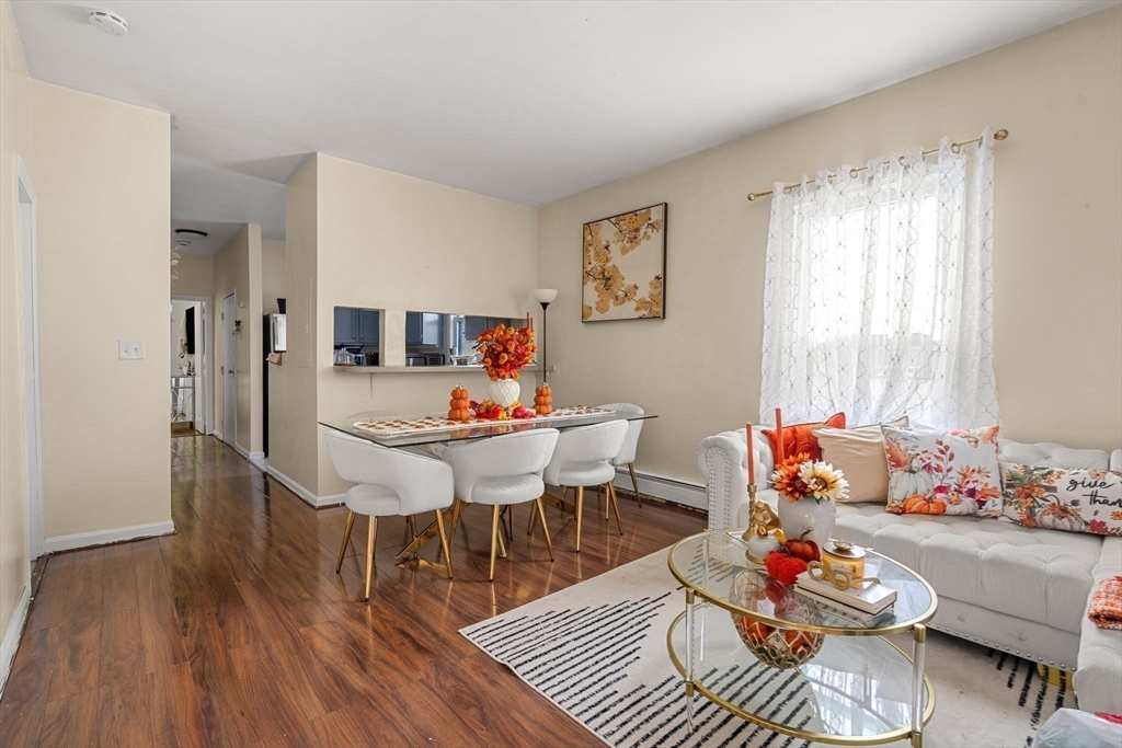 90 Timson Street Lynn, MA 01902 - Photo 20 of 38 a living room with furniture and window