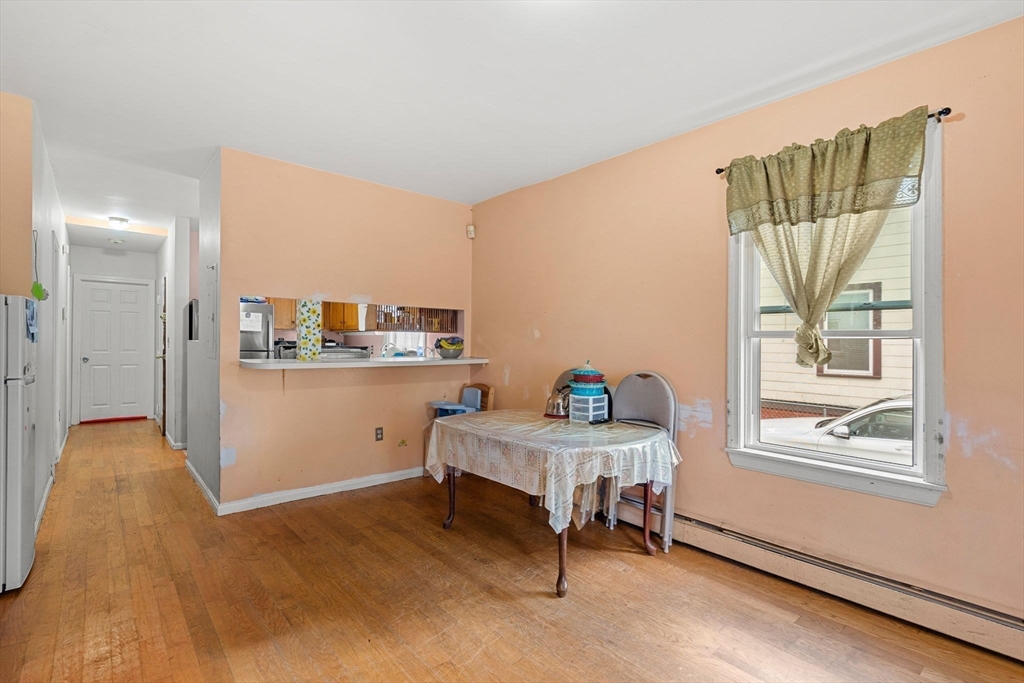 90 Timson Street Lynn, MA 01902 - Photo 9 of 38 a workspace with furniture and window