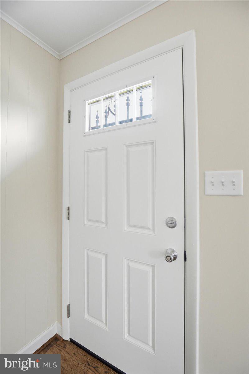 38125 Louis Thomas Road Avenue, MD 20609 - Photo 8 of 73 FRONT DOOR IN LIVING ROOM NEW 2026 YR