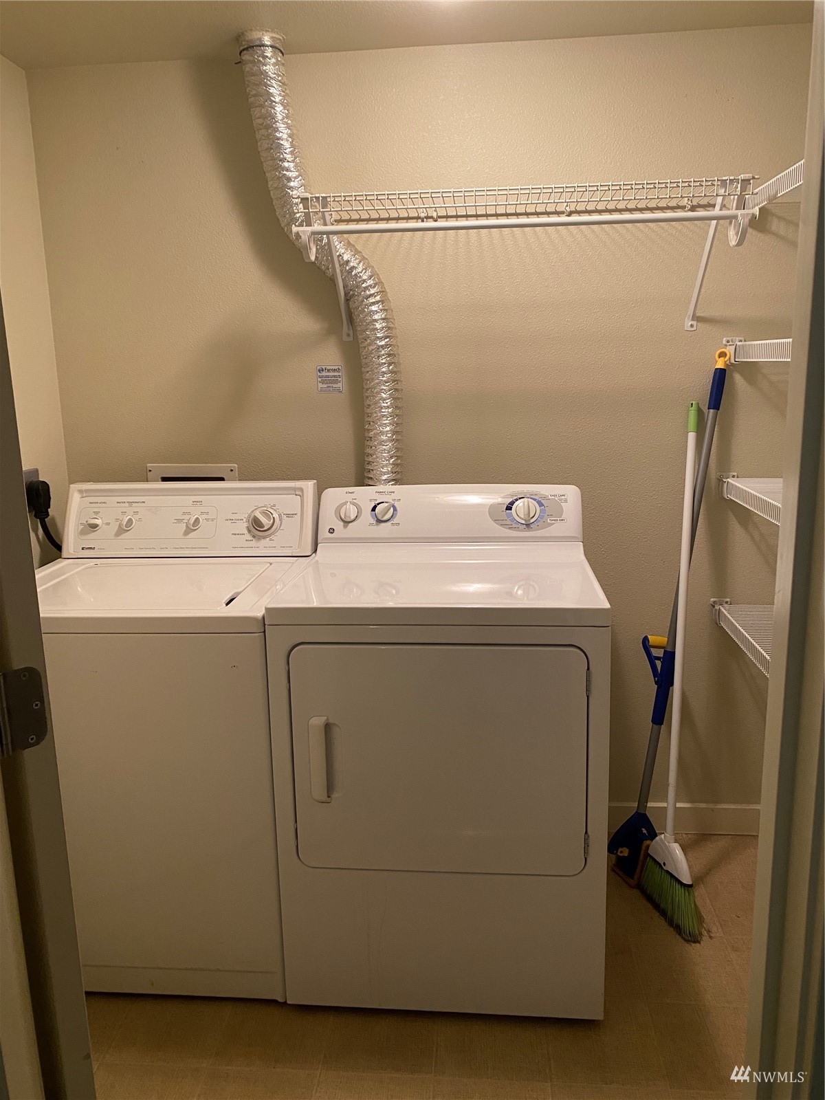 9805 Avondale Road Northeast, Unit X162 Redmond, WA 98052 - Photo 11 of 19 a utility room with dryer and washer