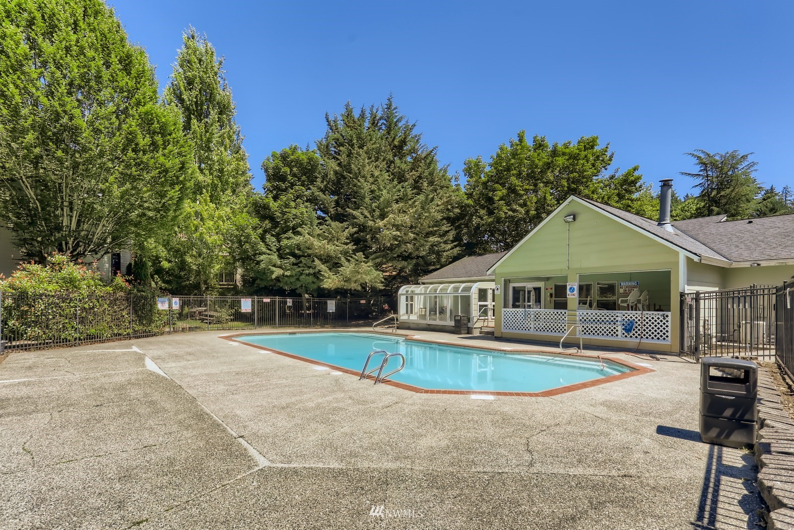 9805 Avondale Road Northeast, Unit X162 Redmond, WA 98052 - Photo 14 of 19 a front view of a house with garden